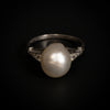 Antieke ring met natuurlijke parel en diamant