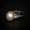 Antieke ring met natuurlijke parel en diamant