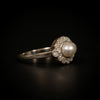 Antique gold ring with natural pearl and diamonds