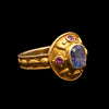 Gouden ring met saffier en robijnen