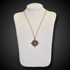 Antique star-shaped pendant with diamonds