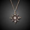 Antique star-shaped pendant with diamonds