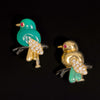 Set Cartier broches, vogeltjes op tak