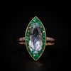 Gold ring with aquamarine and emeralds
