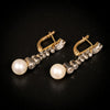 Antieke oorbellen met diamanten en parels