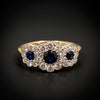 Ring with three clusters of sapphires and diamonds