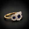 Ring with three clusters of sapphires and diamonds