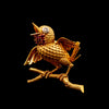 Gouden vogelbroche met robijn