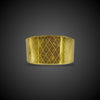 Gold bangle with star pattern