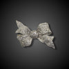 Art Deco bow brooch in platinum with diamonds