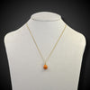 Eivormige hanger in goud en email