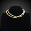 Parelcollier met slot met saffier en diamanten