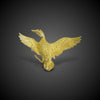 Gold brooch of a duck flying away