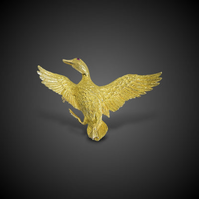 Gold brooch of a duck flying away - #1