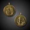 Gold pendant with engraved initials