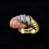 Gold ring with coral bird head
