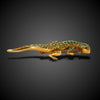 Lizard brooch with emeralds and diamonds