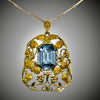 Gold pendant with floral and leaf motifs and aquamarine